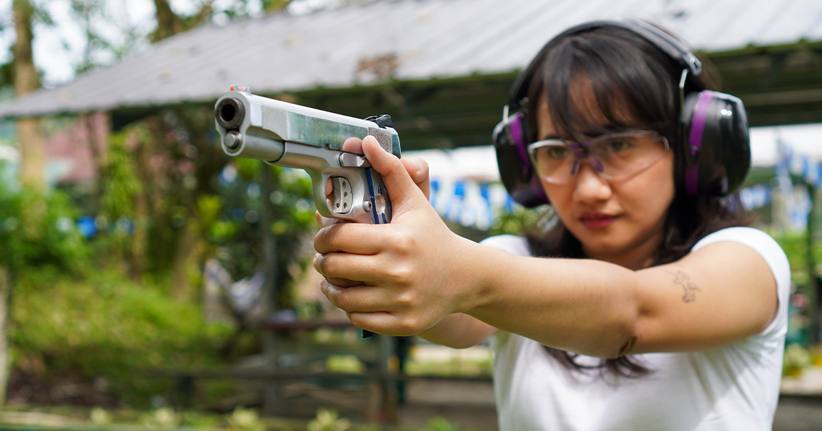 how should you hold a handgun for maximum accuracy